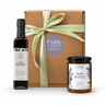 Gift set with balsamic vinegar, lavender honey, and a brown box labeled 'Park Winters' on a white background.