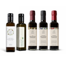 Five bottles of olive oil and balsamic vinegar with labels on a white background